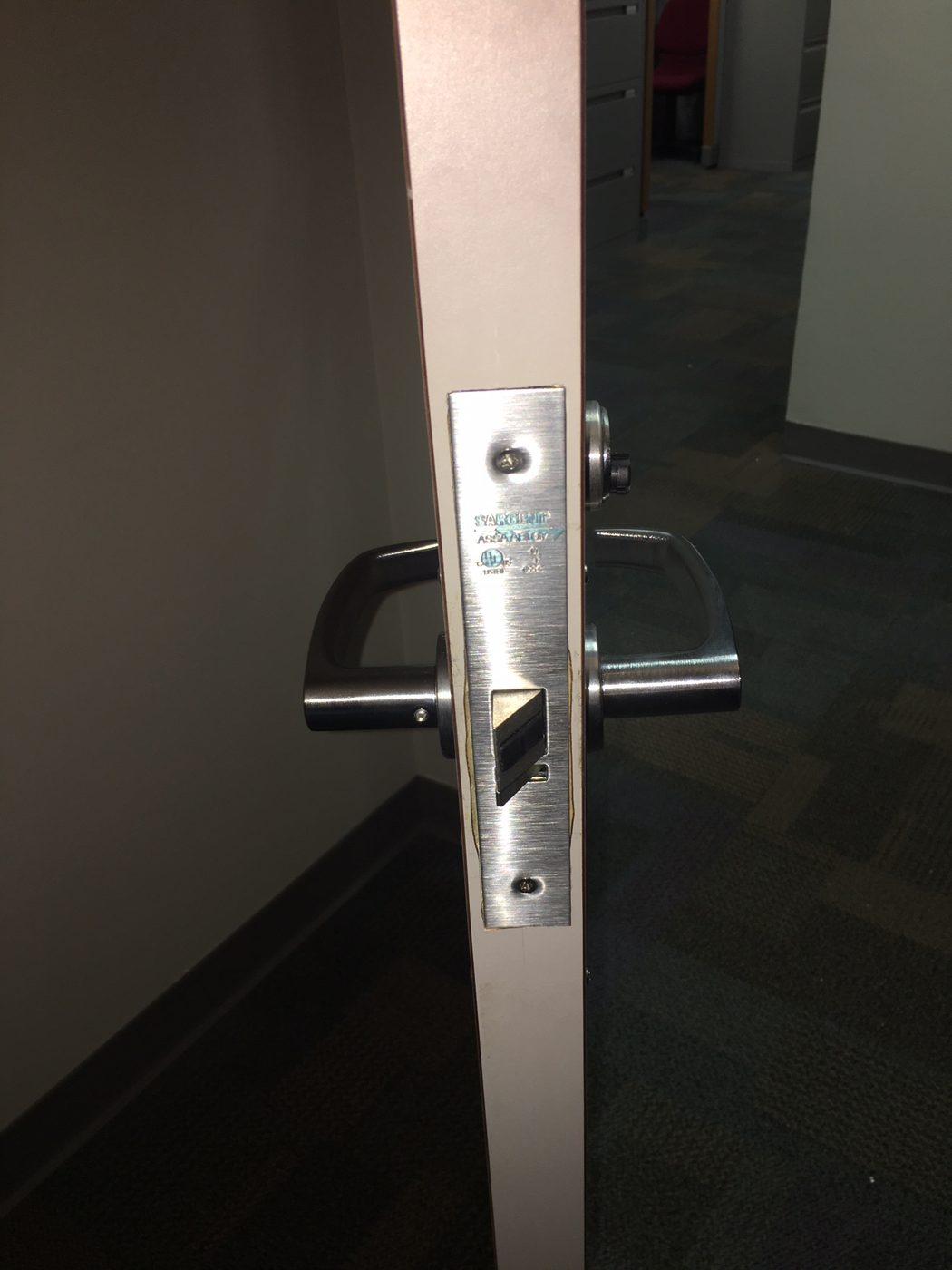 Commercial electrified mortise lockset installed on an interior door